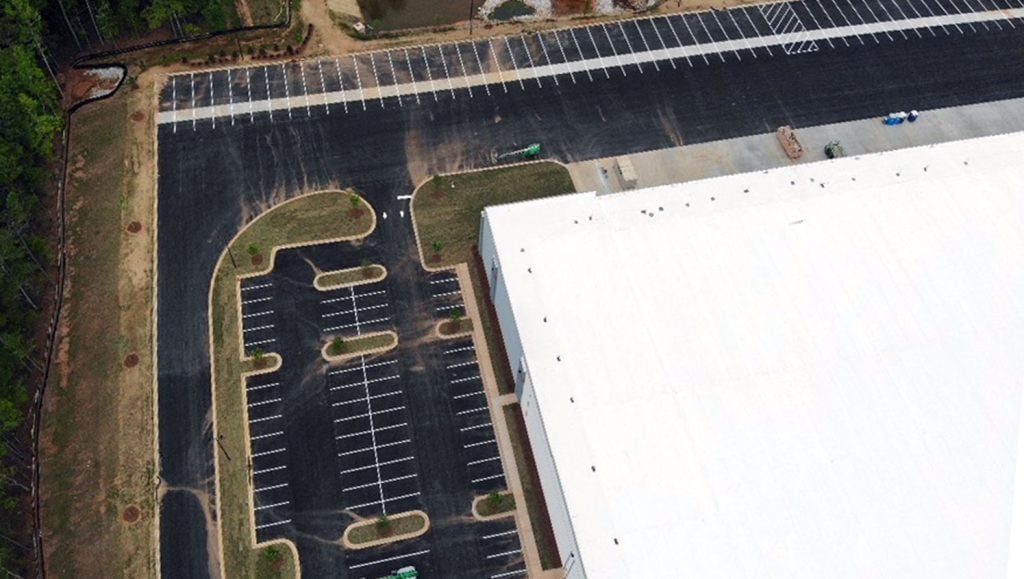 birds eye view of rear parking lot striping in Austell, GA