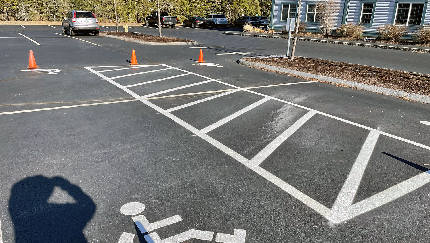 newly striped ADA accessible parking stalls