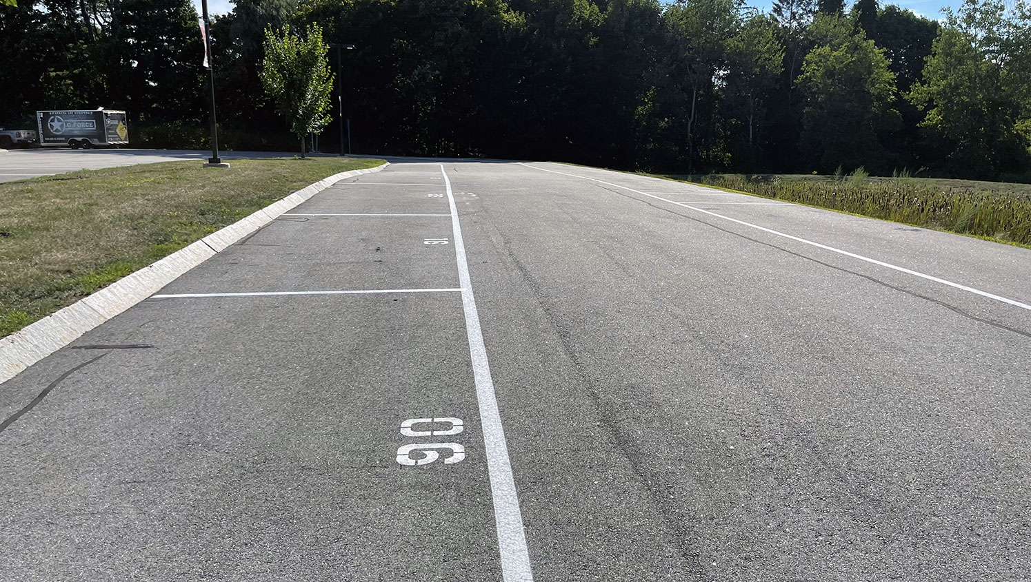re-striped numbered parking spaces