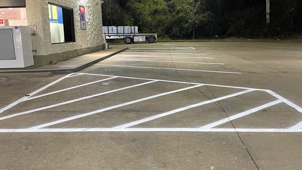 close-up of crosswalk freshly painted for Circle K parking lot