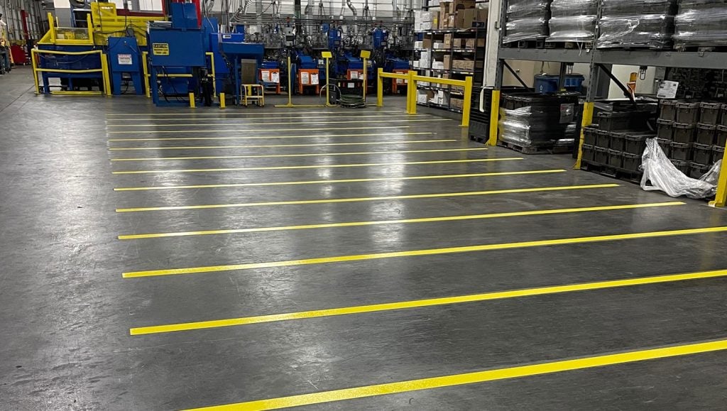 Wegmann Automotive warehouse with freshly painted line markings