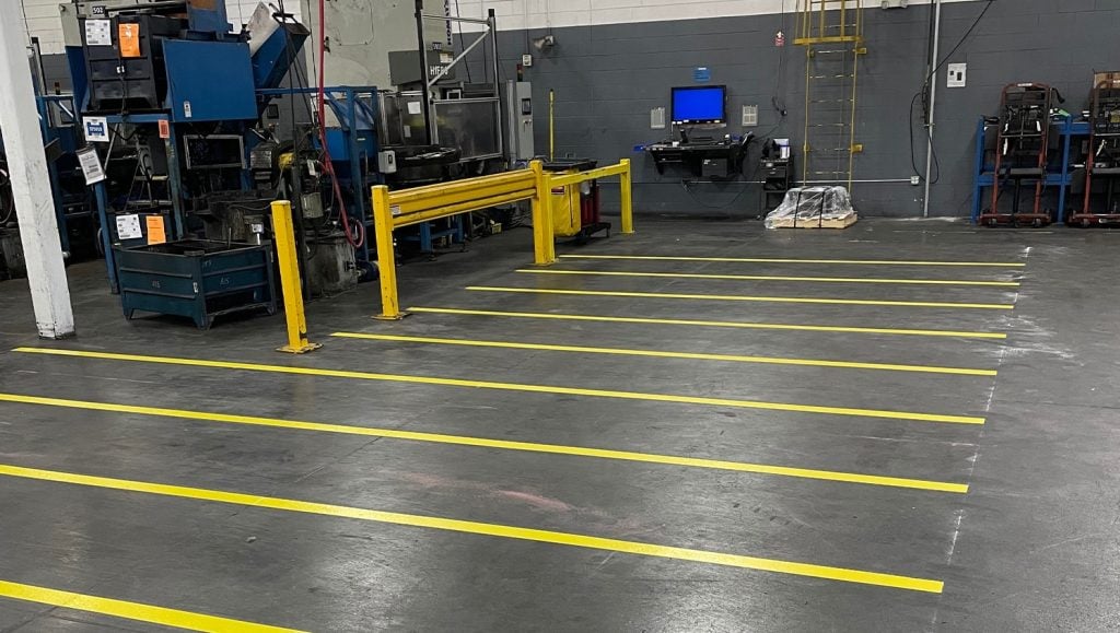 close-up of line markings freshly painted for Wegmann Automotive warehouse