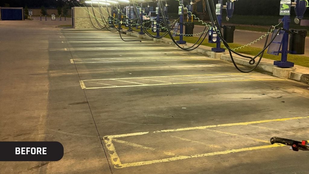 close-up of faded lines in Glide Express Car Wash parking lot