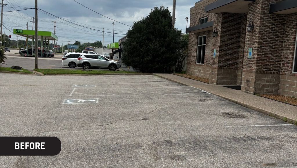 Sidecar Cafe parking lot with faded lines
