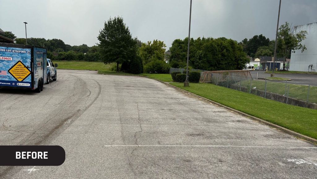 Sidecar Cafe parking lot with faded parking spots