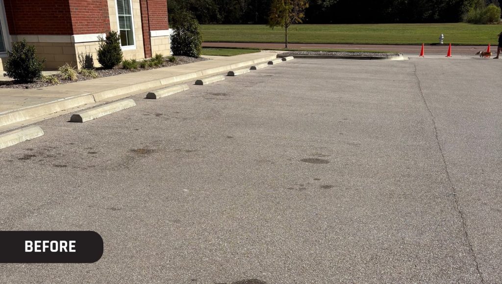 The Learning Experience parking lot before new line markings installed