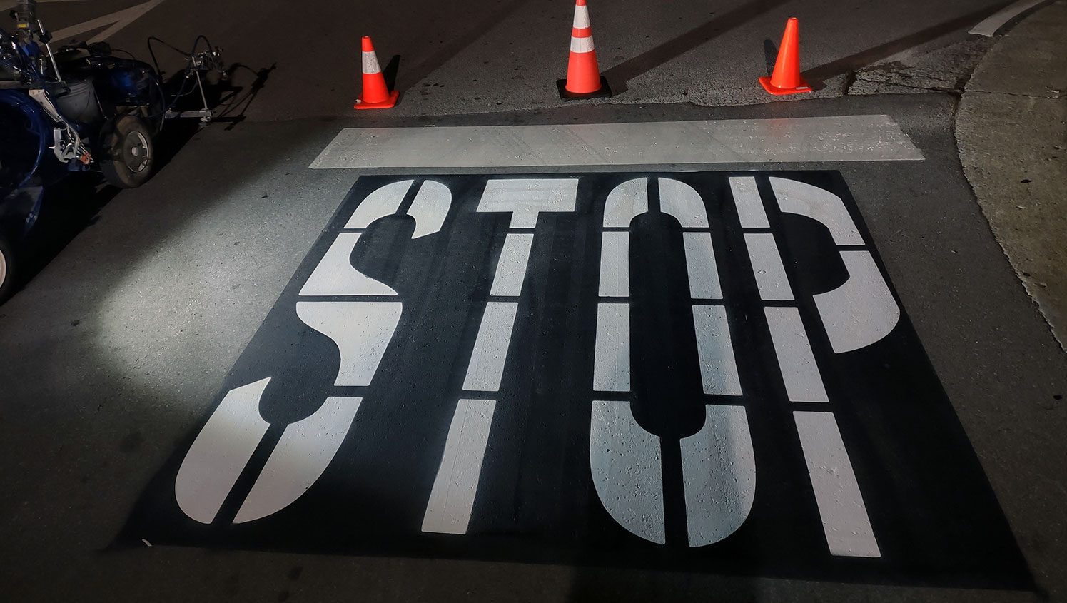 newly stenciled STOP line and word