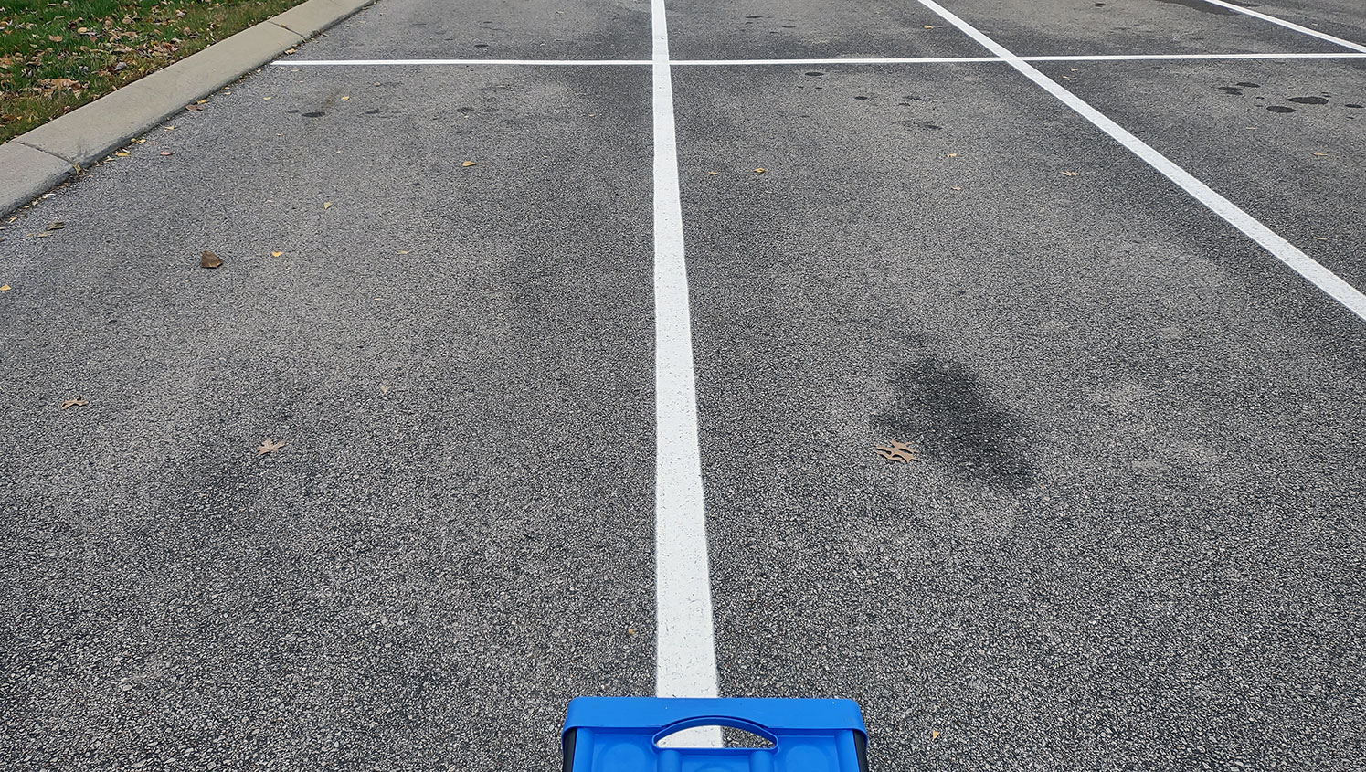 newly striped parking stall lines