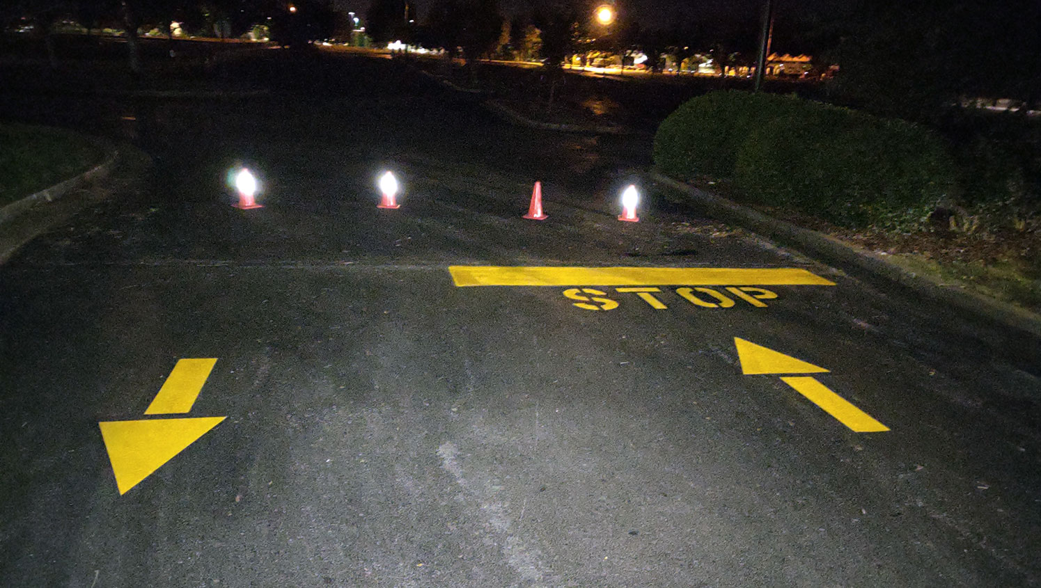 newly striped stop lines and arrows