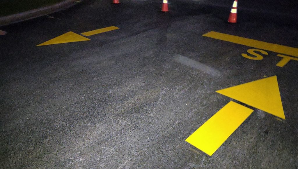 newly striped stop lines and arrows