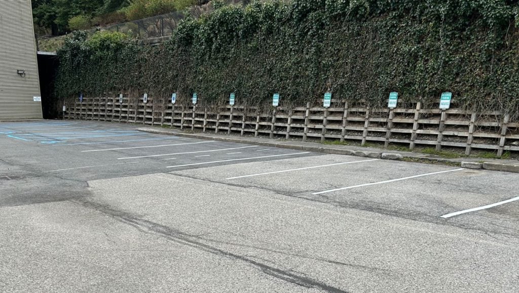 parking spots freshly painted for Consuner Reports parking lot