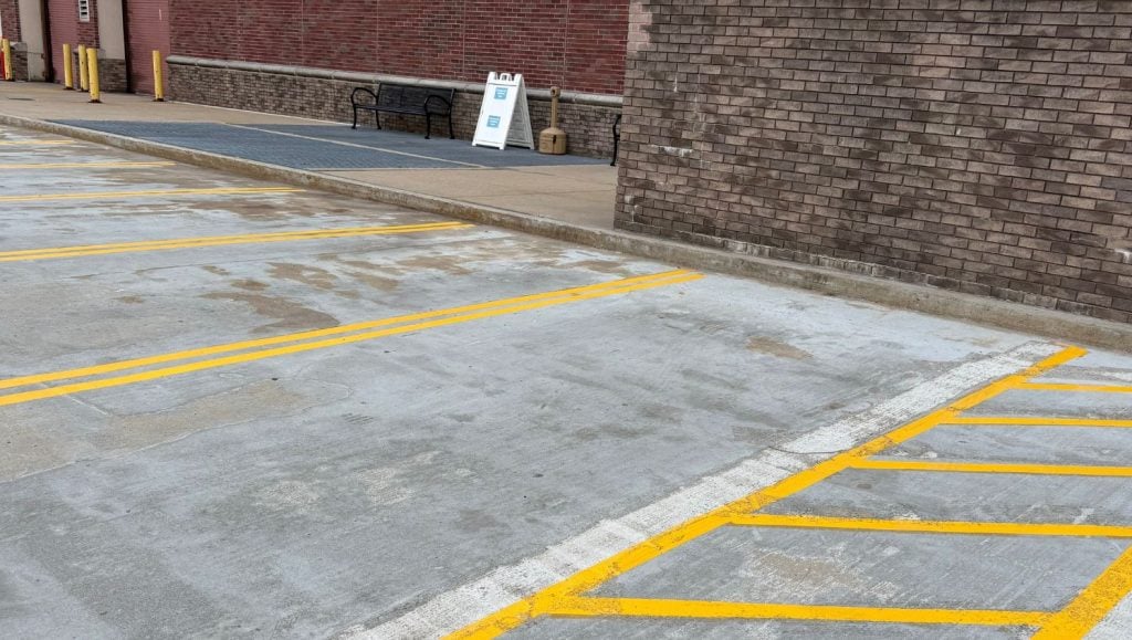 close-up of parking spots freshly painted for city hall parking lot