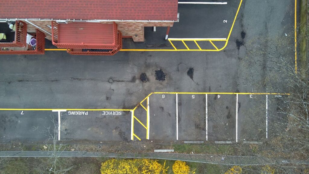 parking spots freshly painted for Leonia Court parking lot aerial view
