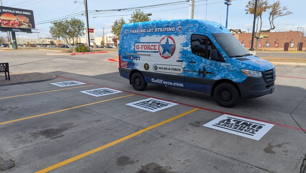 ada compliance parking spots freshly painted for Buffalo Wild Wings parking lot