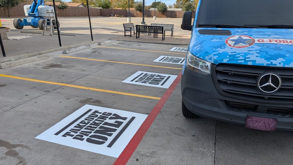 fire lane striping freshly painted for Buffalo Wild Wings parking lot