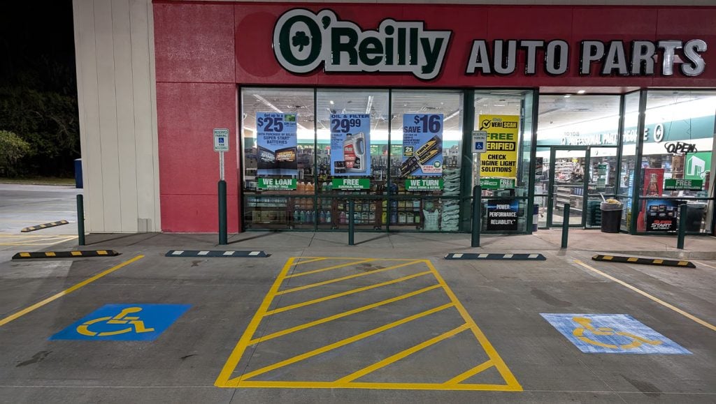 ada compliance parking spot with G-FORCE® truck in O'Reilly Autoparts parking lot