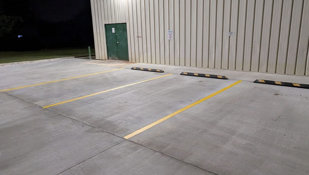 ada compliance parking spots freshly painted for O'Reilly Autoparts parking lot