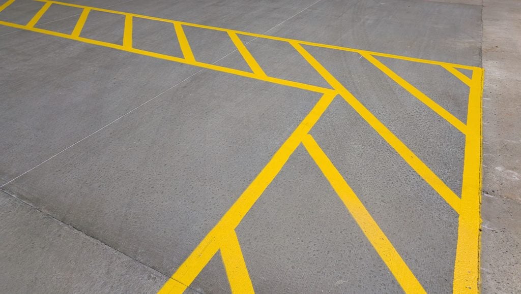crosswalk freshly painted for O'Reilly Autoparts parking lot