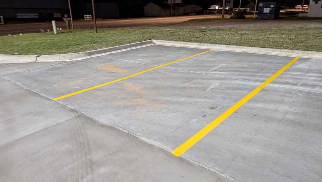 parking spots freshly painted for O'Reilly Autoparts parking lot