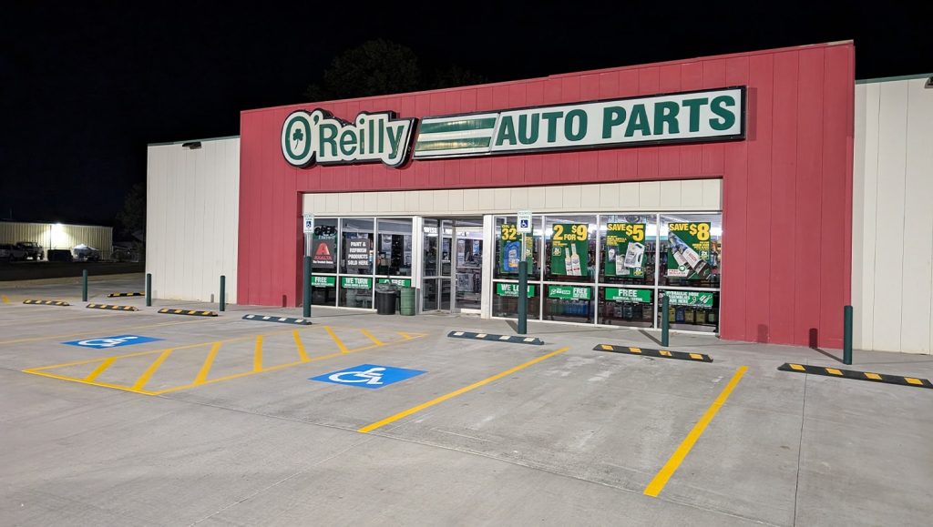 close-up of freshly painted ada compliance parking spots for O'Reilly Auto Parts