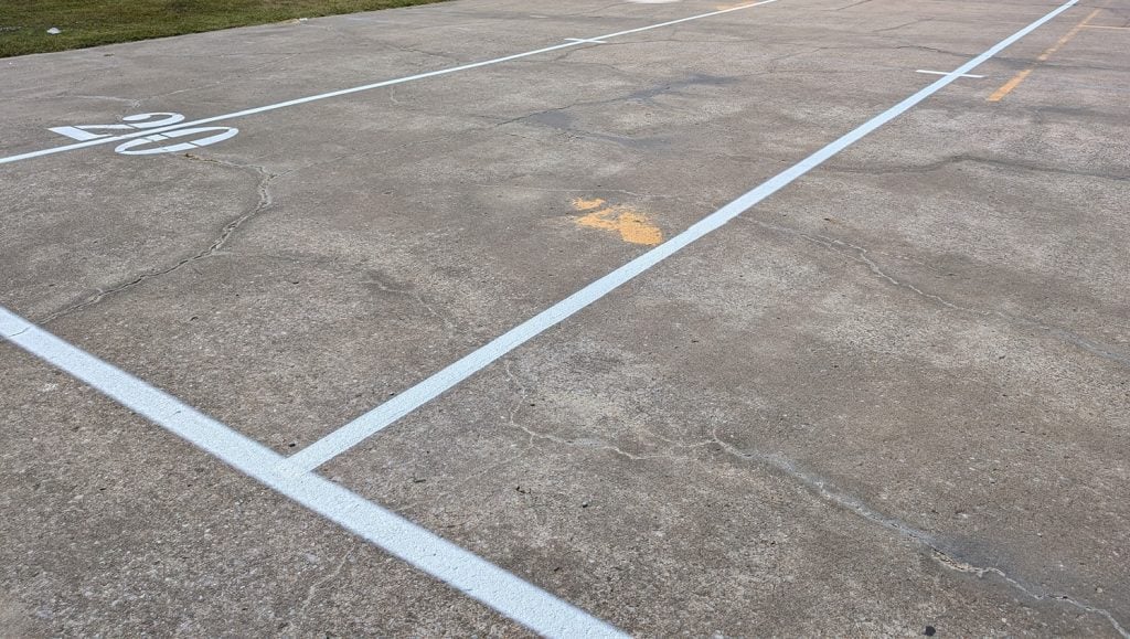 athletic field markings freshly painted for Fort Gibson High School