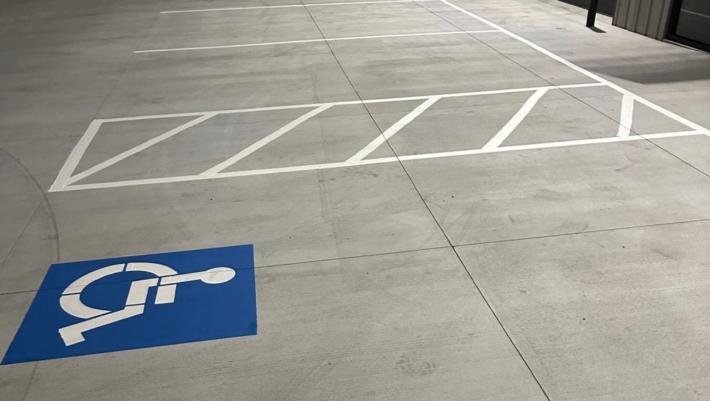 freshly painted parking spot lines for business park parking lot