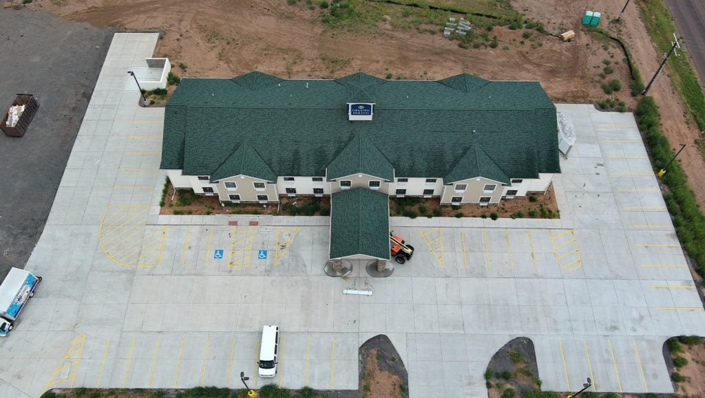 aerial view of Cobblestone Hotel parking lot before line markings