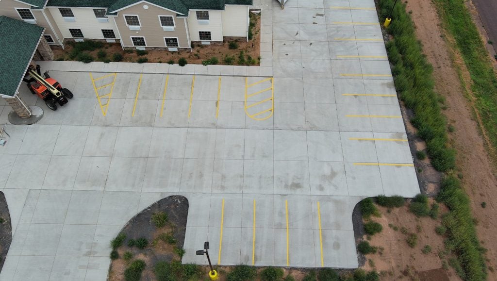 aerial view of Cobblestone Hotel parking lot with new installed parking signage