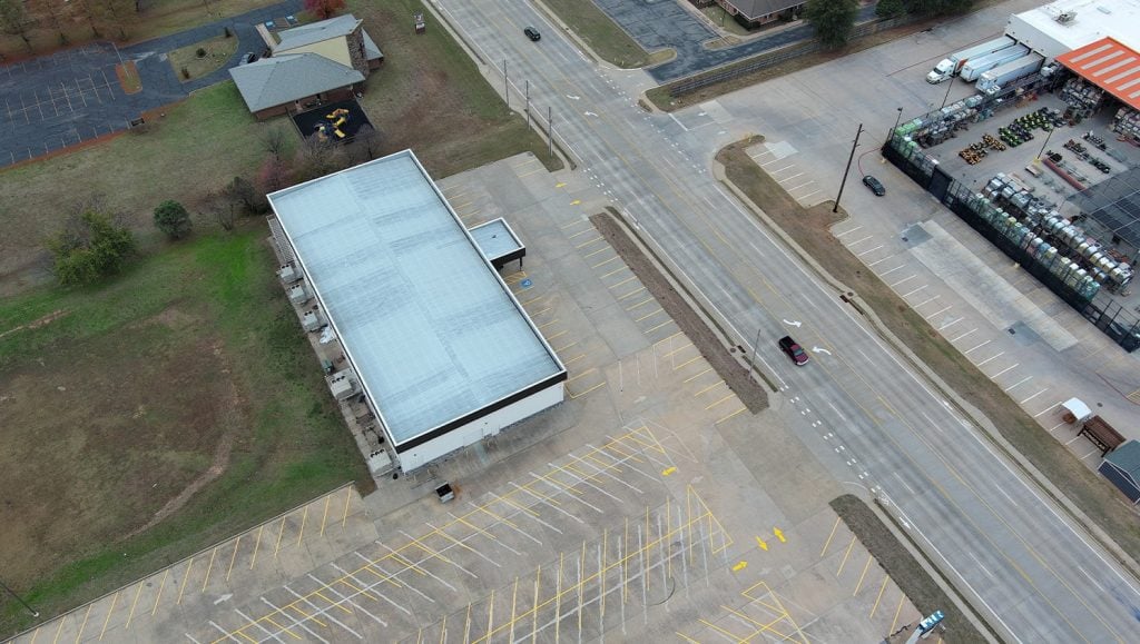 aerial view of Owasso First Assembly Church parking lot with freshly painted parking spots