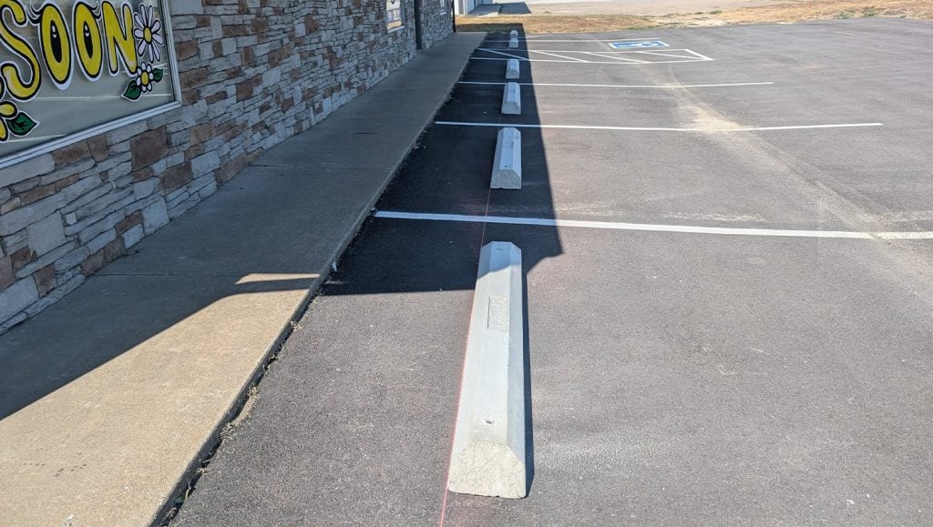 Lakeside Eyecare parking lot with new parking stops