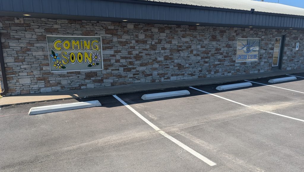 close-up of parking stops installed for Lakeside Eyecare