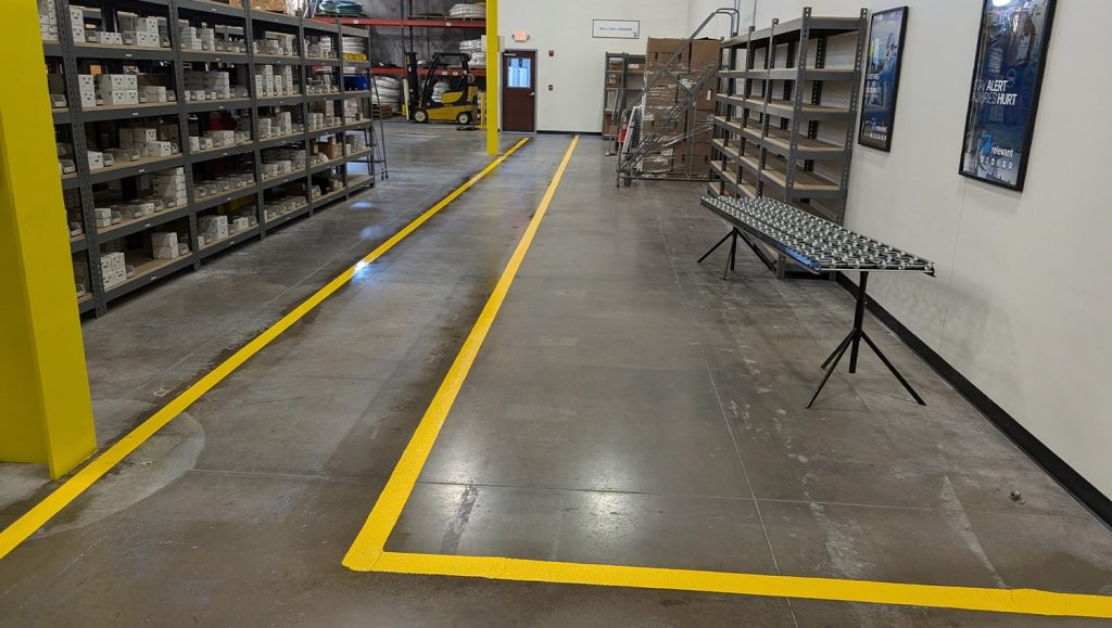 close-up of yellow line markings for warehouse