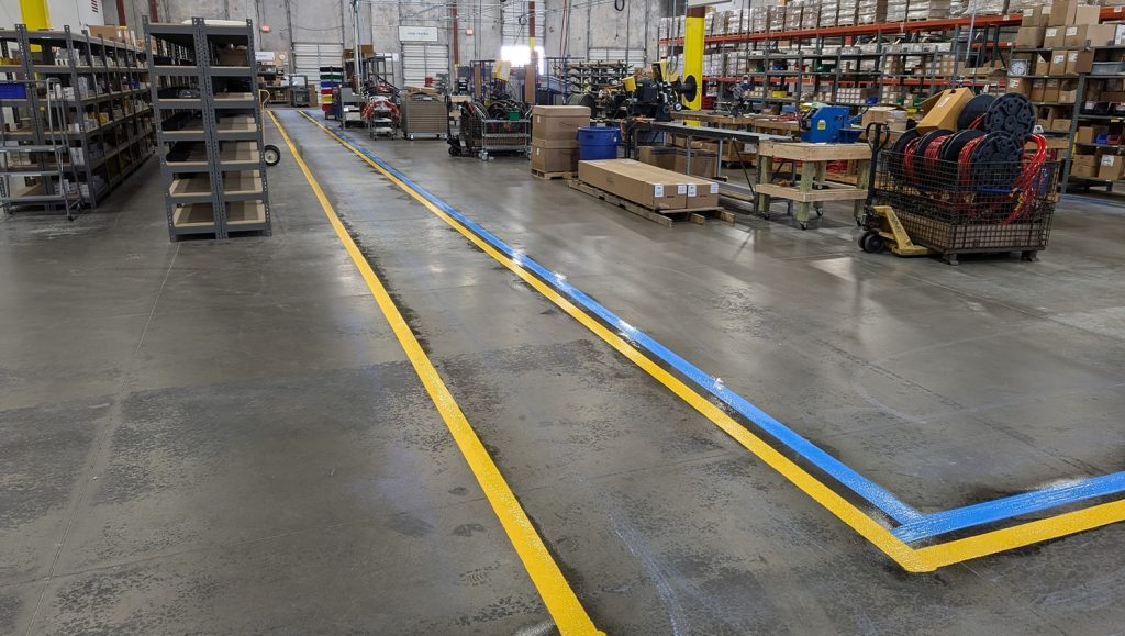 close-up of freshly painted line markings for warehouse