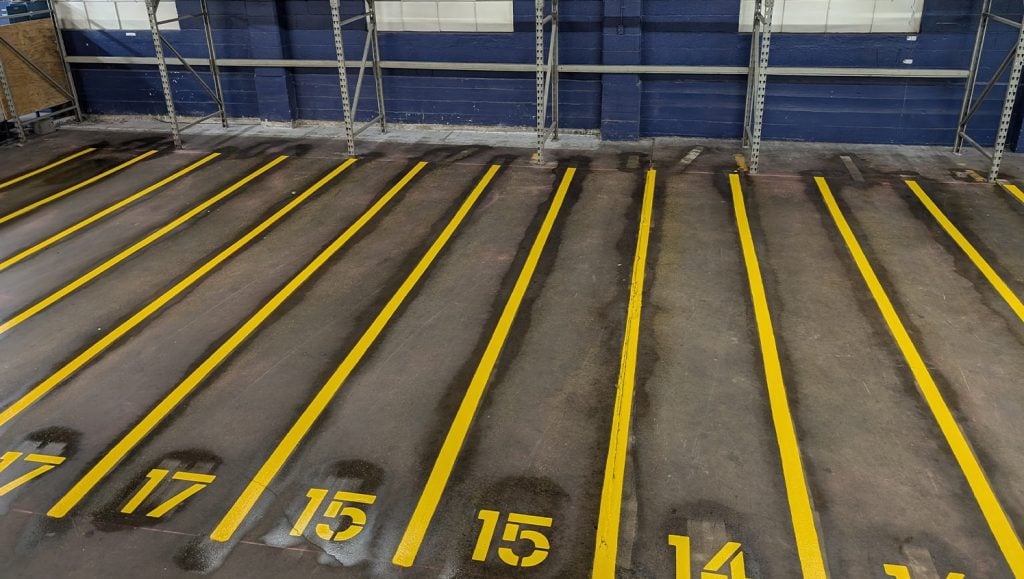 warehouse floor markings freshly painted for Superior Linen