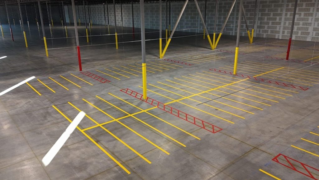 aerial view of DART Entities warehouse with freshly painted line striping