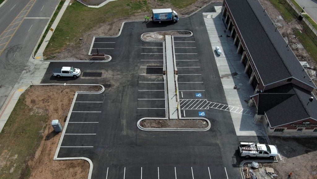 aerial view of freshly painted parking lot for Sjostrom and Sons Christian Bros Automotive
