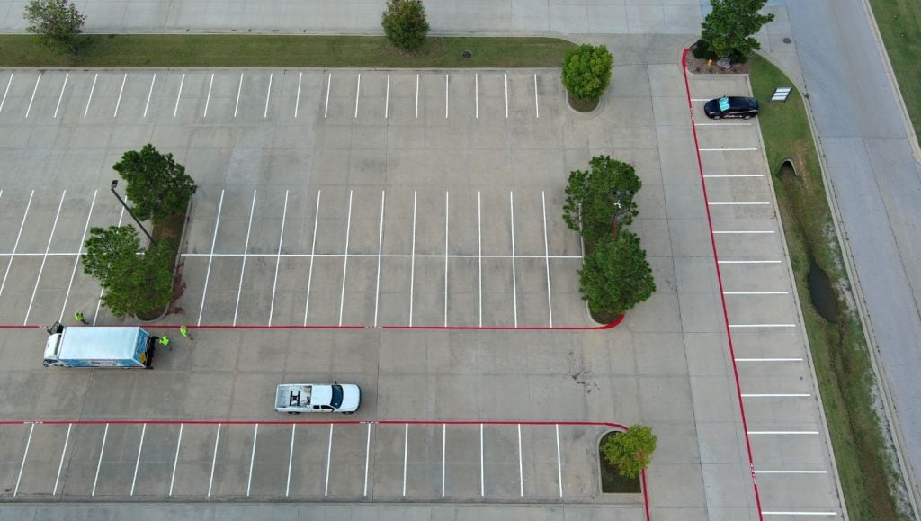 parking spots freshly painted for Gateway Mortgage parking lot aerial view