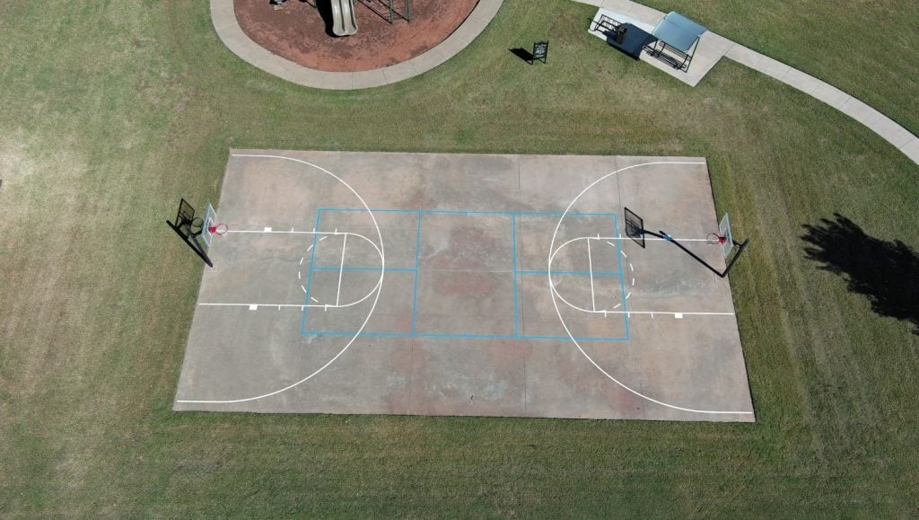 basketball court freshly painted for Frisco Ridge HOA aerial view