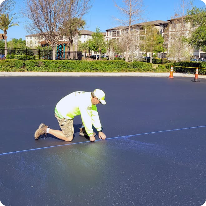 asphalt sealcoating services in progress