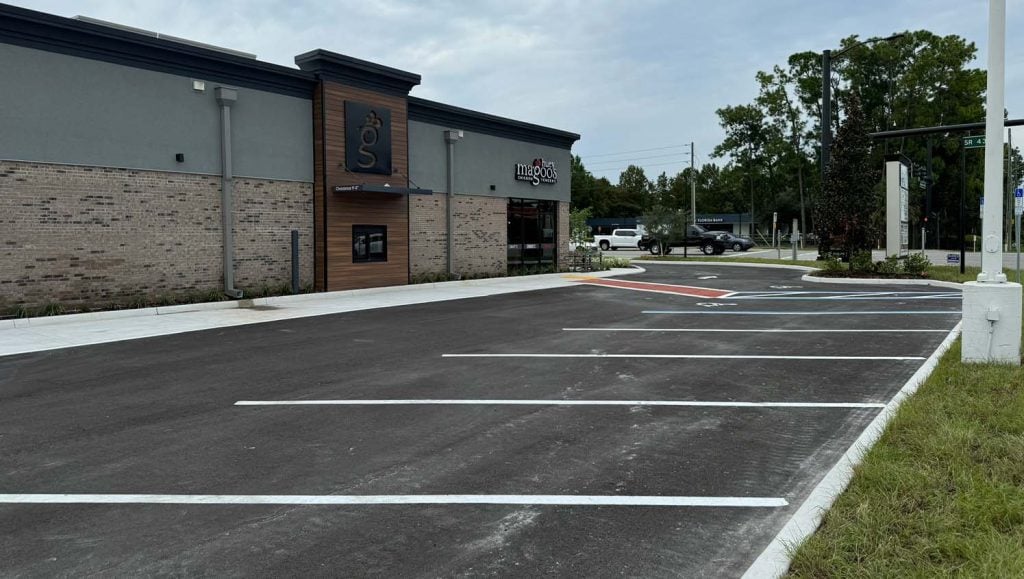 close-up of freshly painted parking spots for Huey Magoo's Chicken Tenders