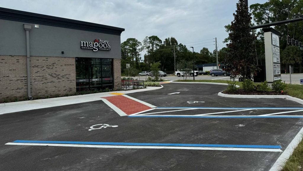 freshly painted line markings for Huey Magoo's Chicken Tenders parking lot