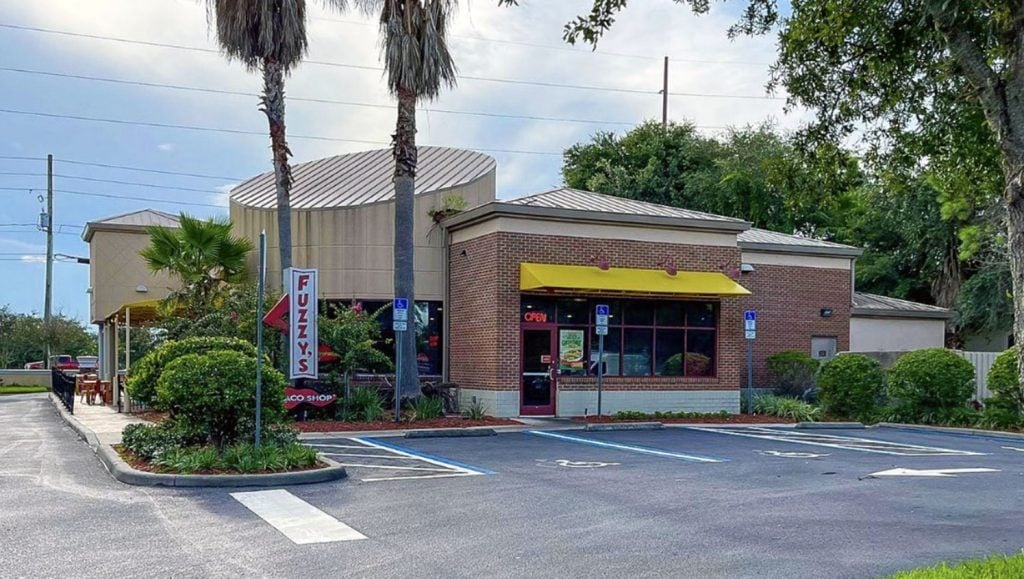 freshly lined parking lot stalls at tex-mex restaurant