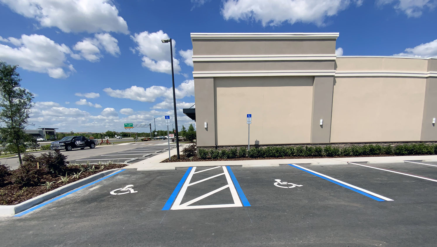 ADA compliant parking stalls painted in Orlando, FL commercial striping project