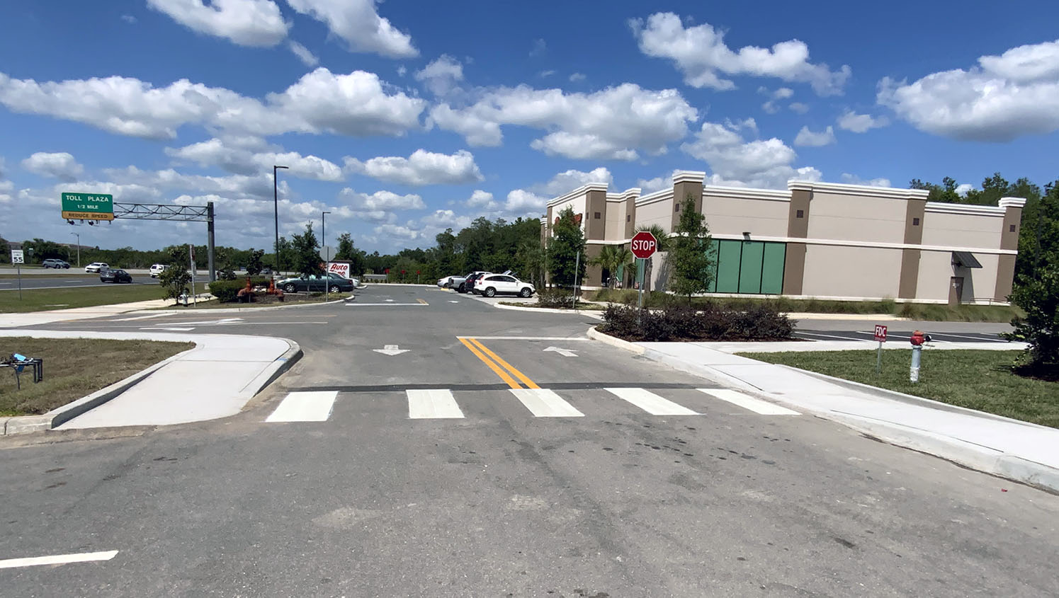 new thermoplastic crosswalk marked inside Orlando, FL commercial property lot