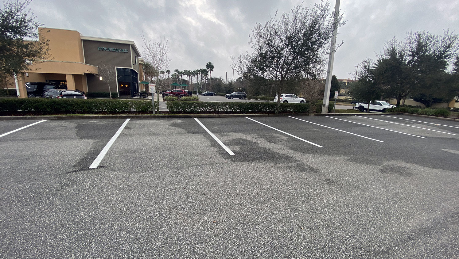 forward view of restriped parking stalls at a Freddy’s Frozen Custard & Steakburgers in Orlando, FL