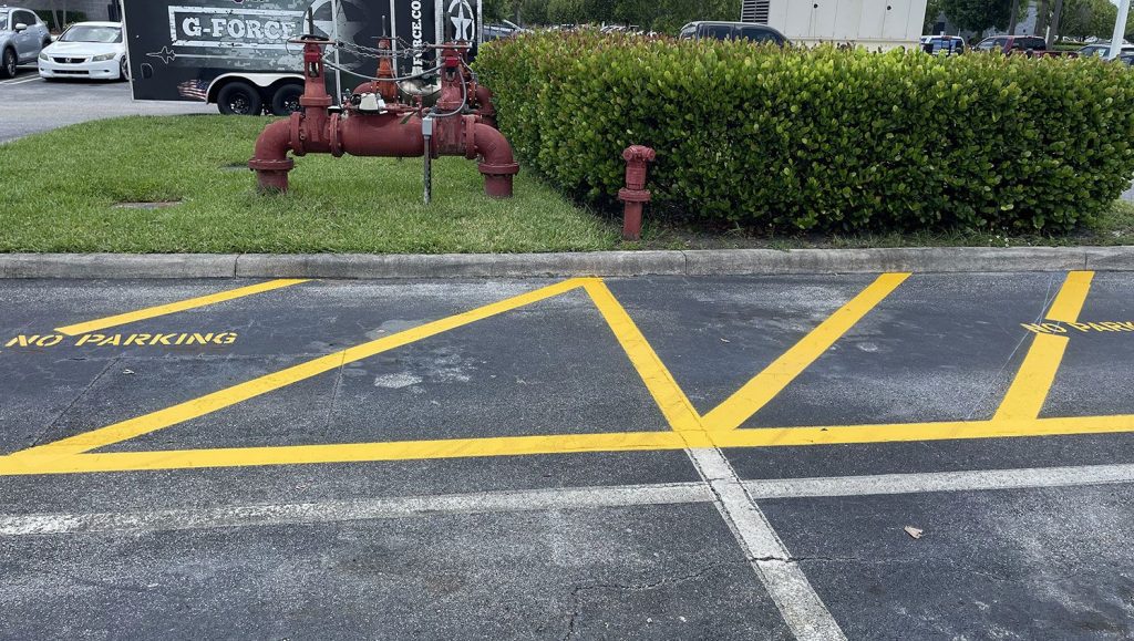 “no parking” zone striping