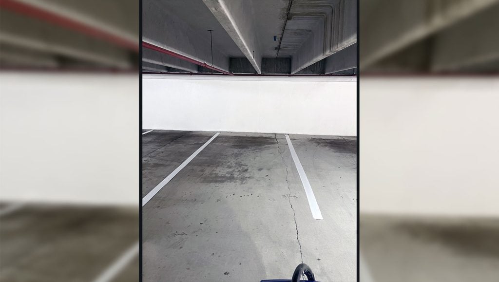 re-striped parking spaces inside parking garage
