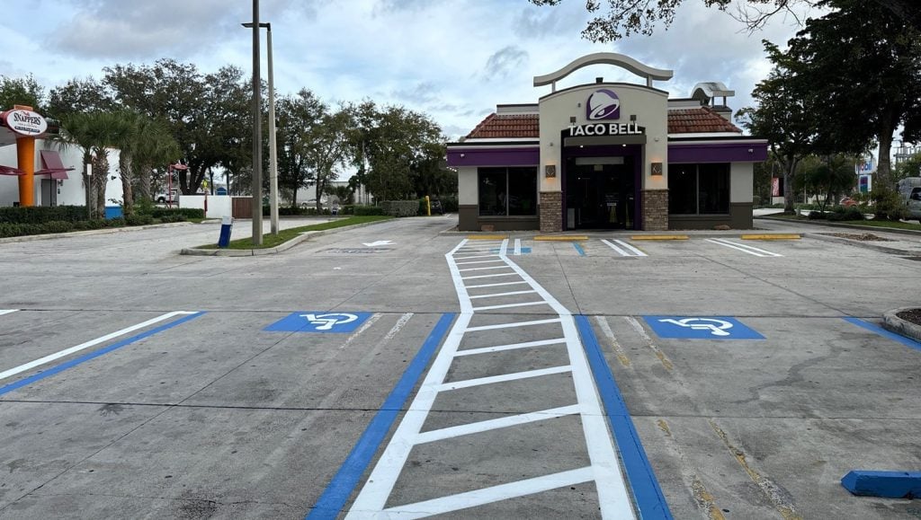 freshly painted line markings for taco bell parking lot