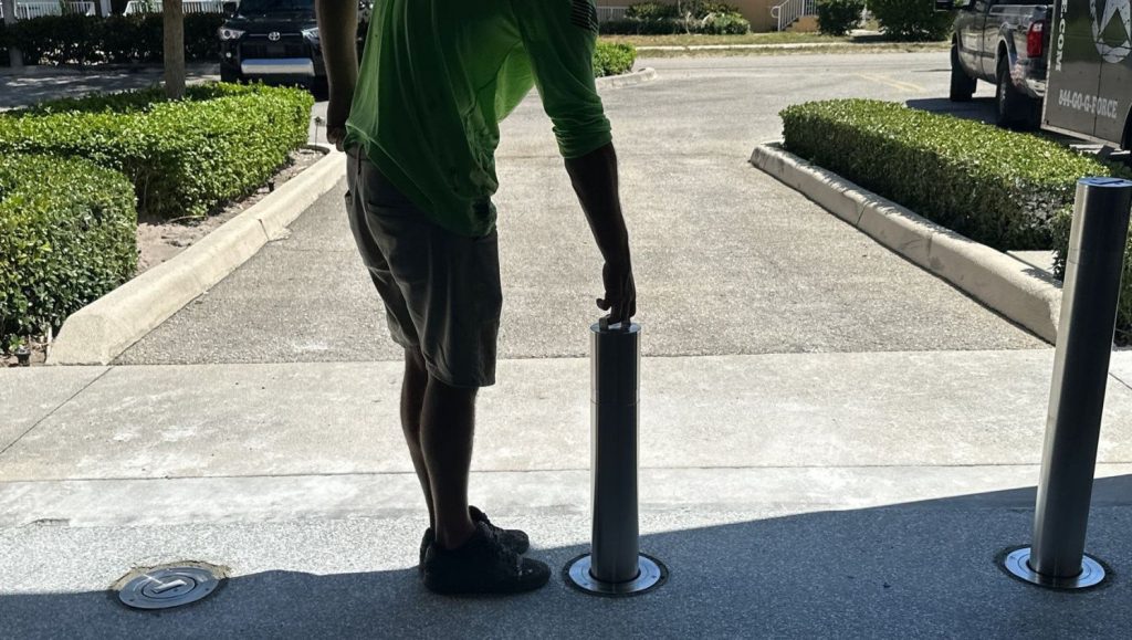 G-FORCE® employee touching bollard