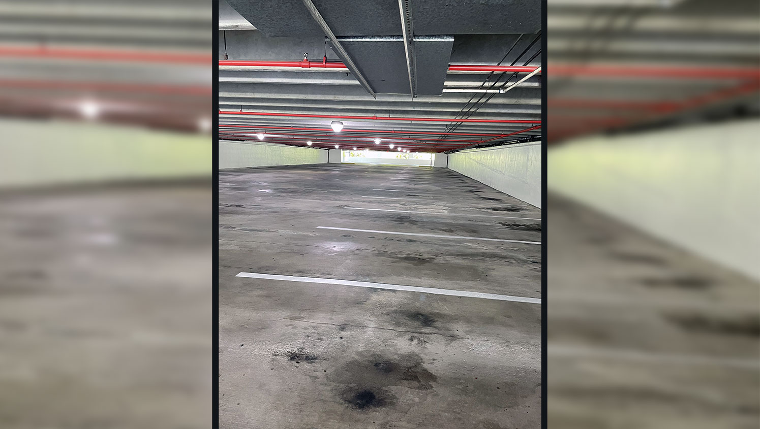 side view of re-striped parking garage stalls